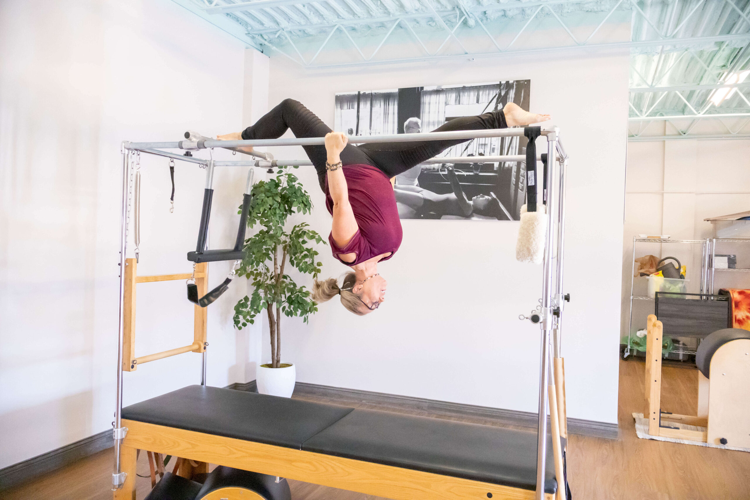 Woman doing specialized Pilates exercises for whole body health